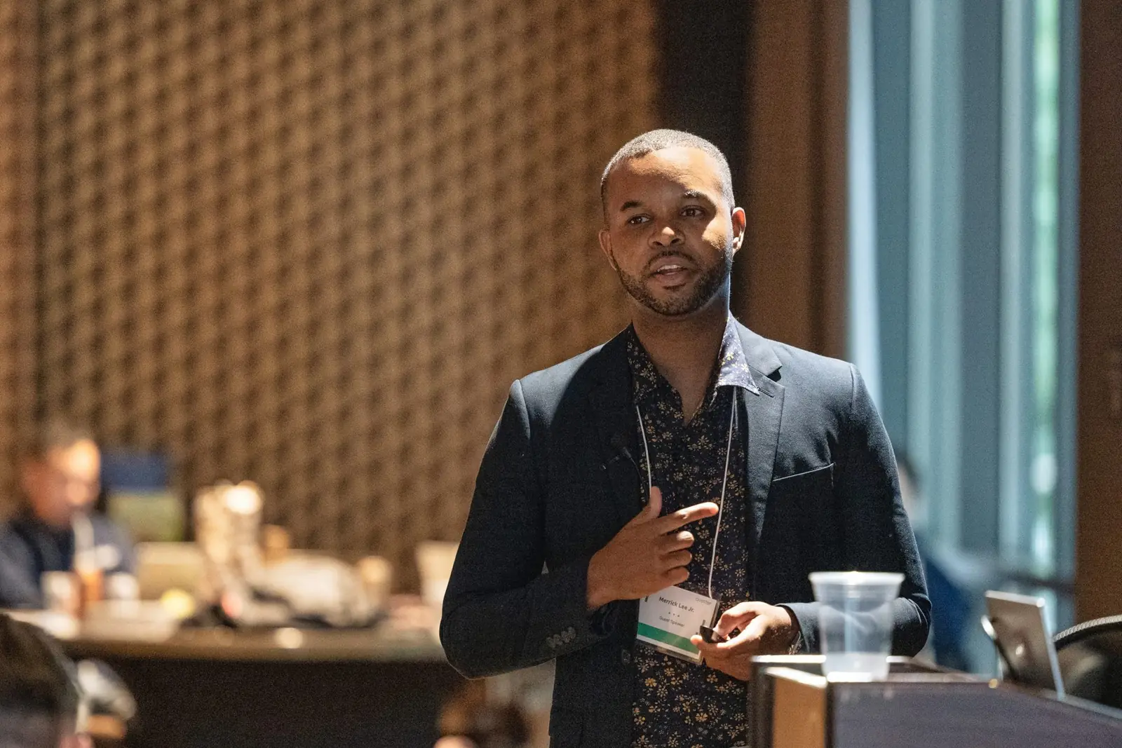 Fractional CMO Merrick Lee Jr. speaking to business owners and investors